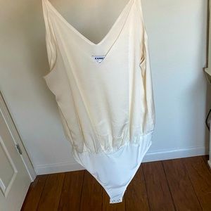 Women’s Express cream blouse body suit